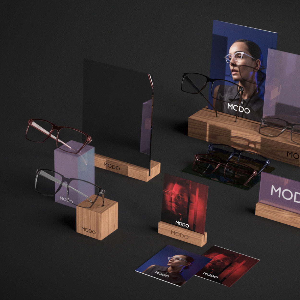 3D overview of MODO Eyewear retail displays, including brand plaque, mirror, and counter cards.