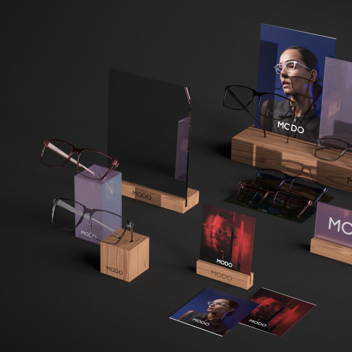 3D overview of MODO Eyewear retail displays, including brand plaque, mirror, and counter cards.